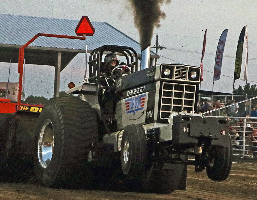 Darin Weers of Diller drives the Top Gun tractor Tuesday at the Washington County Fairgrounds.