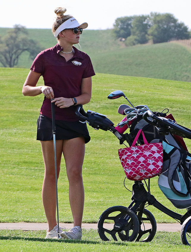 Arlington's Grace Jones watches her group's tee shots Thursday at River Wilds Golf Club.