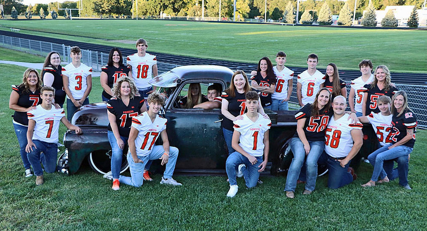 The Fort Calhoun football seniors — who play today at Platteview — recently had their photo taken with their mothers. Front row, from left: Sunshine and Austin Welchert, Michelle and Avery Quinlan, Cortney Raether and Mason Touring, Nicole Irvine and Jose Soriano, Bobbie Jo and Joe Doyle, and Sara and Dylan Boldt. Back row: Melissa and Glenn Hunter, Ginger and Wyatt Appel, Jody Klein and Tristan Hansen, Gina and Mason Bliss, and Annie and Sam Halford. Not pictured: Nicole and Zach Nelson.