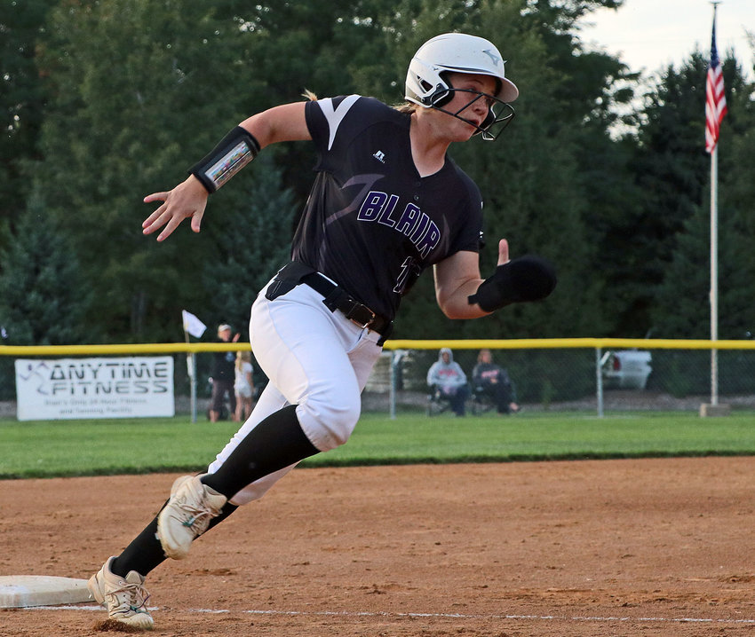 Blair base runner Brooke Janning races around third base toward home plate Monday at the Youth Sports Complex.