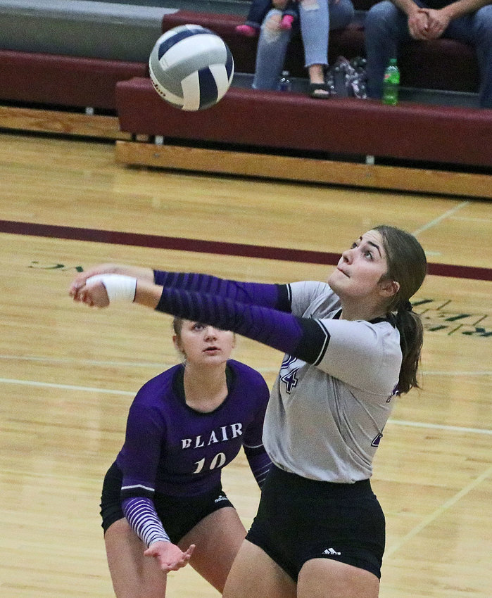 Blair's Peyton Ogle, right, makes a play on the ball with support from Savanah Roan on Thursday at Arlington High School.