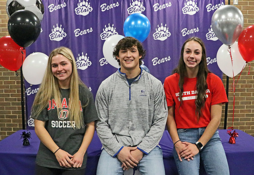 Blair High School seniors Keara Chaffee, from left, Shea Wendt and Tessa Villotta all signed with Division I college athletic programs Wednesday morning.