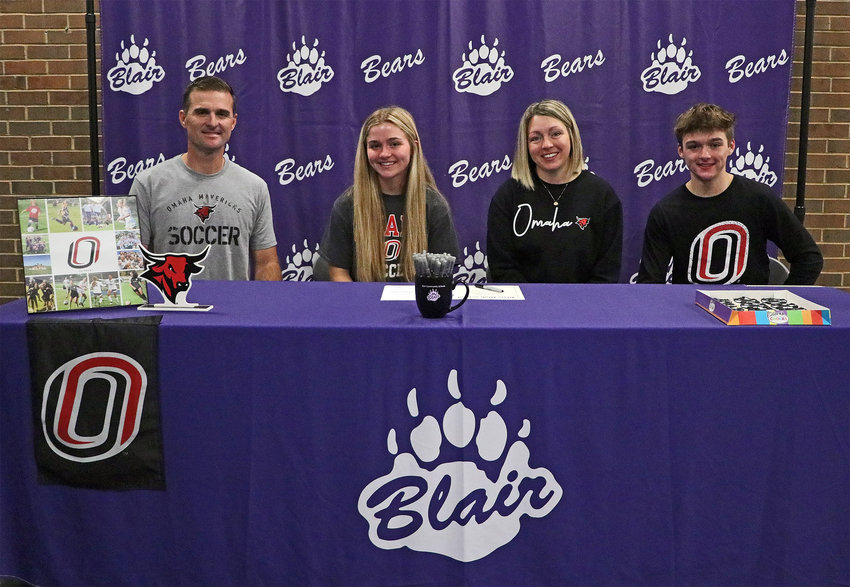 Blair senior Keara Chaffee poses for a photo with her family after signing with the Omaha Mavericks soccer team Wednesday.