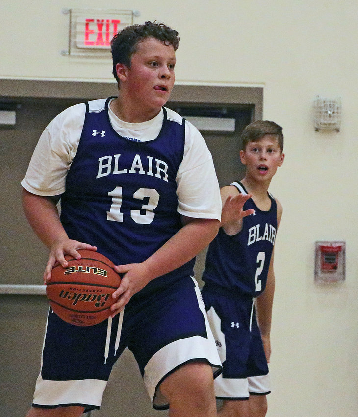 Crosby Swanson, left, and Cam Clements of the Blair Purple sixth-grade team competes Saturday at FCHS.