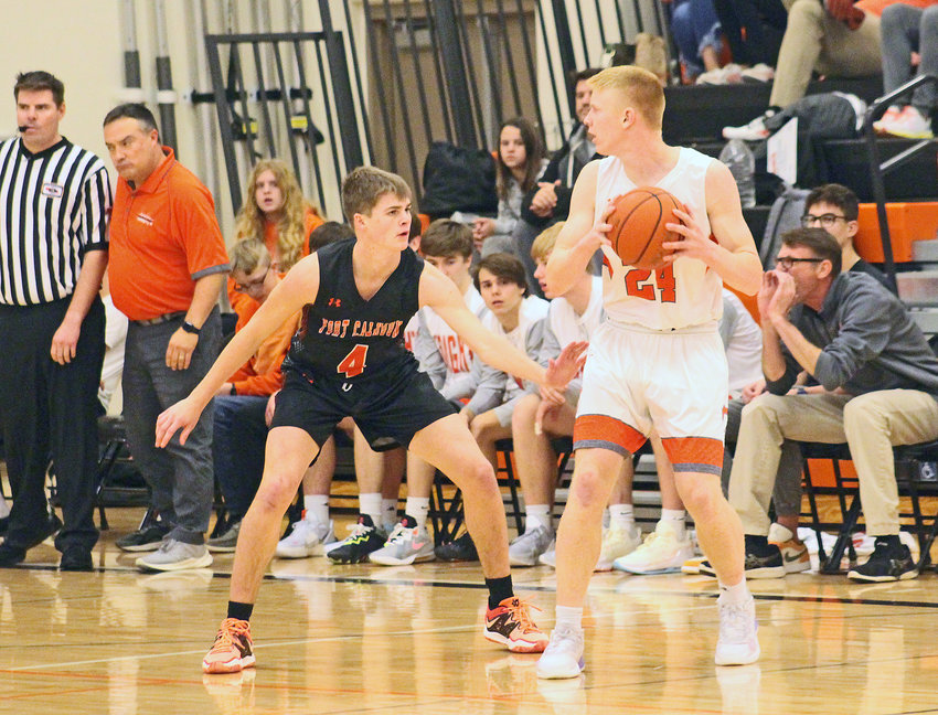 The Pioneers' Grayson Bouwman, left, defends against an Oakland-Craig player Monday at Fort Calhoun High School.