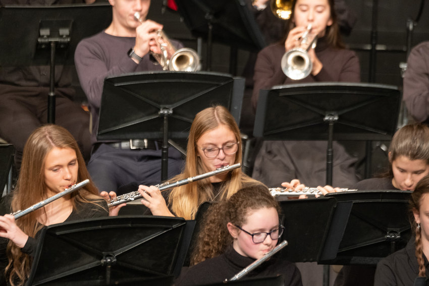 The 11th and 12th grade flutes play during the annual Blair Winter Band Concert.