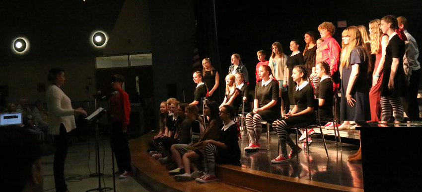 A large group of Otte Blair Middle School students performs the Beatles' classic "Black Bird" at the school's Pops Concert on Nov. 28.