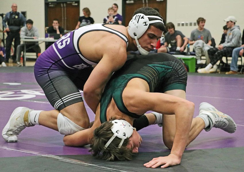 The Bears' Yoan Camejo, left, competes against Nolan Ienn on Tuesday at Blair High School.