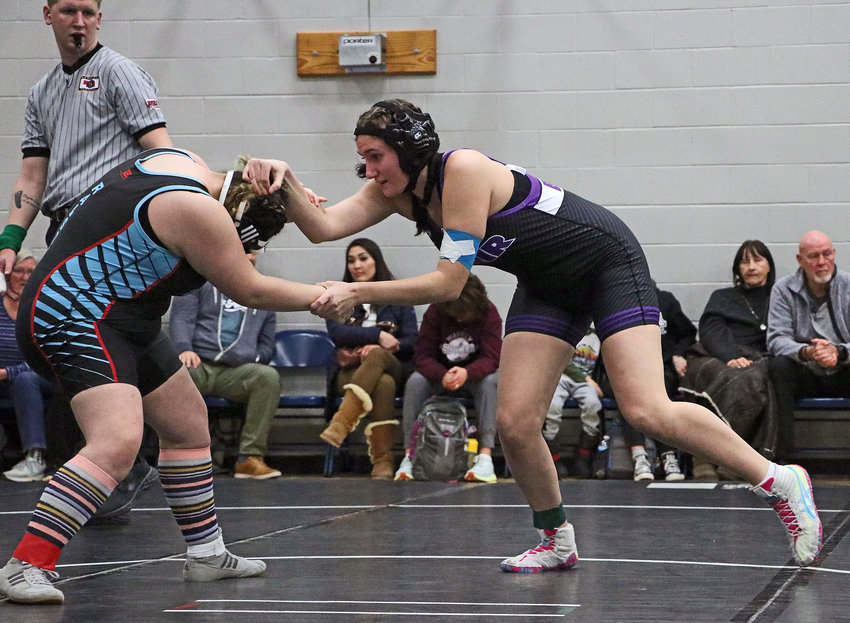Blair wrestler Shelby Kain, right, competes against Ralston's Dezeray Baker on Friday at Plattsmouth High School.