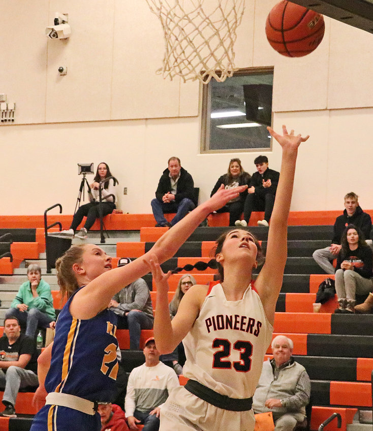 The Pioneers' Bria Bench, right, scores a basket off of the glass Saturday in a Nebraska Capitol Conference Tournament game against Logan View/Scribner-Snyder at Fort Calhoun High School.