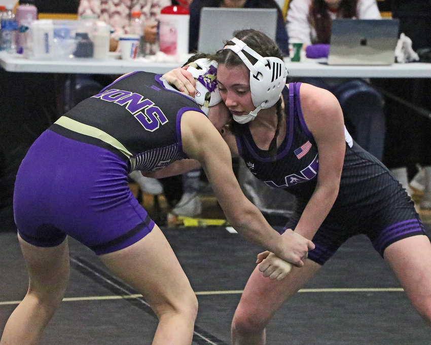 Blair's Riley Martin, right, competes against Louisville's Payton Thiele on Friday at Fremont High School.