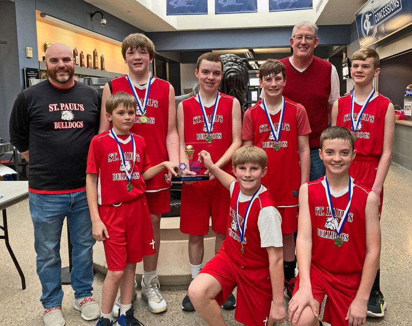 The St. Paul's Lutheran School Bulldogs recently won their Class B bracket during the C-Club Tournament in Seward. Front row, from left: Trevor Cruikshank, Andrew Jess and Logan Hilgenkamp. Back row: Coach Tom Shearer, Parker Robinson, Ethan Hilgenkamp, Liam Shearer, coach Pat Dunklau and Titus Dolezal. Not pictured: Austin Udd.