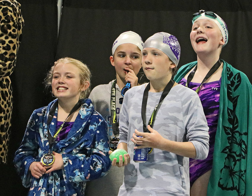 The Blair Family YMCA Swim Team's 200-yard medley relay squad took fourth Saturday in Fremont. Team members, in no particular order, were LeLah Filows, Addison Woehl, Bryher Gassman and Isabel Chrans.