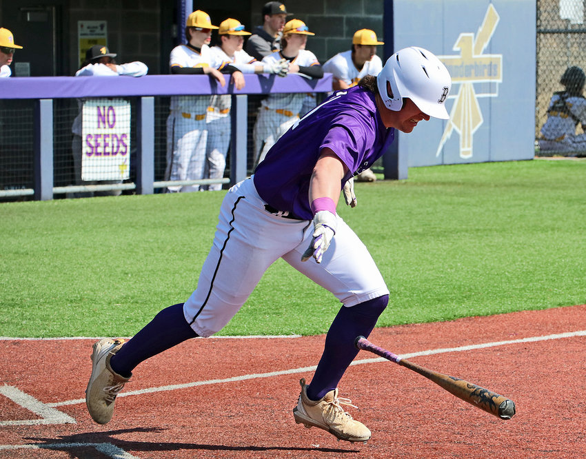 Blair's Brady Brown drops his bat and races to first base Saturday at Bellevue West.