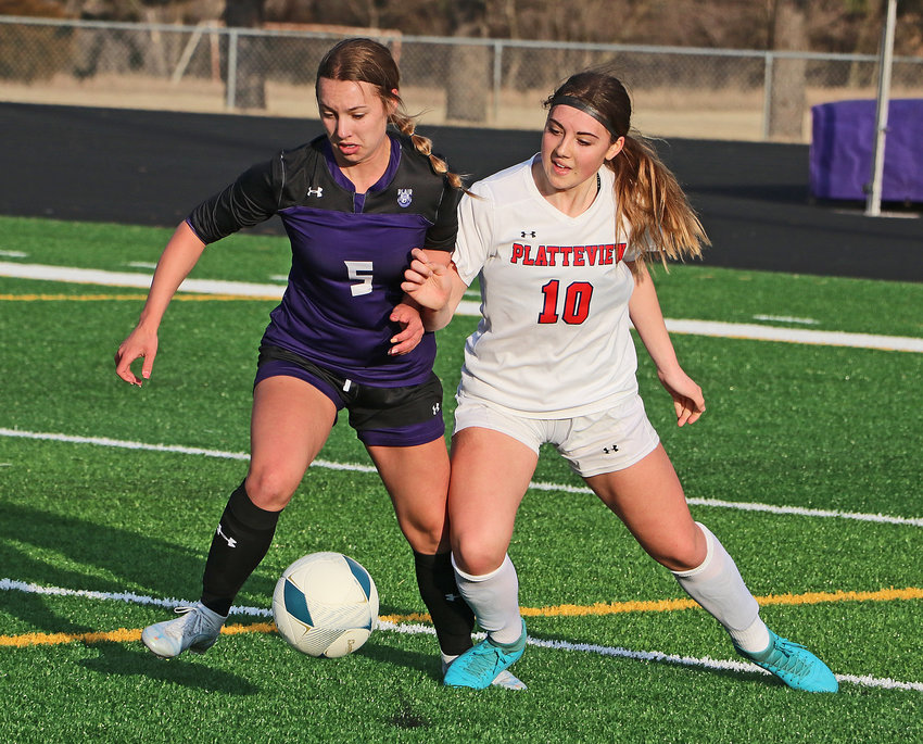 Blair's Claire Anderson, left, battles for possession of the ball with Platteview's Shaylla Hobbs on Friday at Krantz Field.