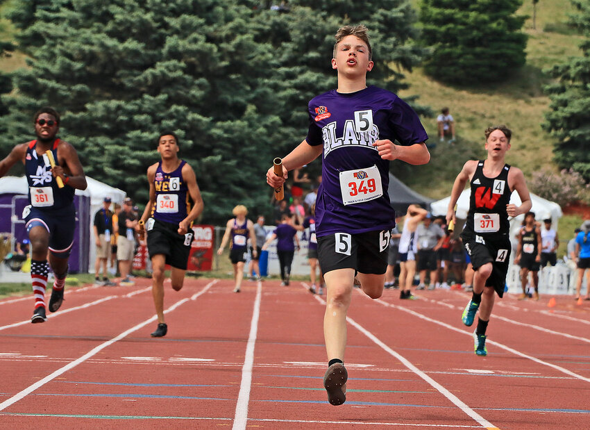 Blair Unified sprinter Riley Yanek races to the finish line of the 400-meter relay Thursday at Omaha Burke Stadium.