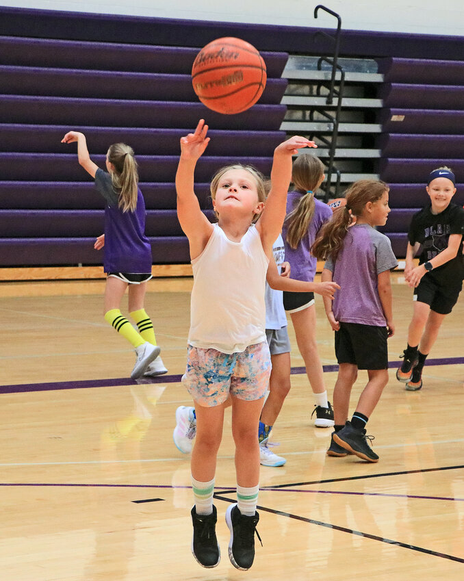 Kendall McManigal, 8, shoots the basketball Tuesday at Blair High School.