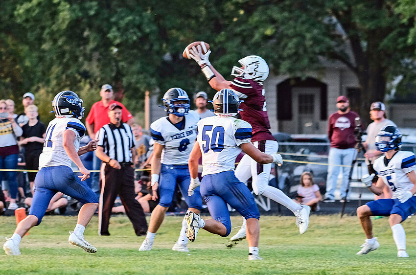 The Eagles' Kieryn Grothe (2) catches a touchdown pass against Pierce on Friday at AHS.