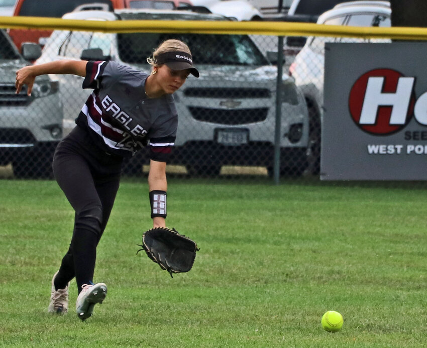 Arlington sophomore Tessa Spivey races toward the ball in centerfield Saturday in West Point.