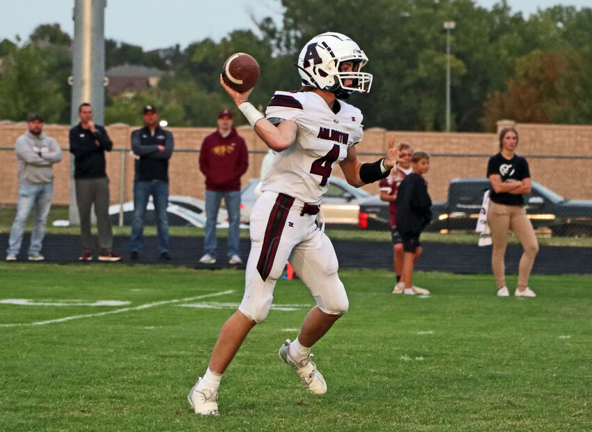 Arlington quarterback Cooper Staats throws a pass Friday at Lincoln Christian.