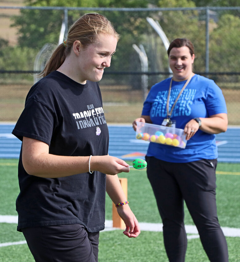 Taylor O'Neil of Blair balances a plastic egg on a spoon Thursday during a relay race at Bennington High School.