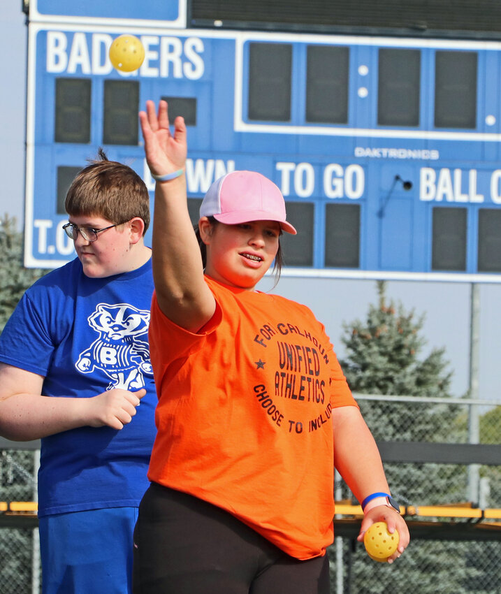 Reilly Rauterkus of Fort Calhoun throws a Wiffle ball Thursday at Bennington High School.