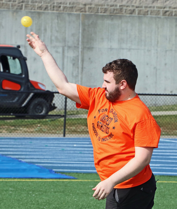 Kameron Pringle of Fort Calhoun throws a wiffle ball Thursday at Bennington High School.