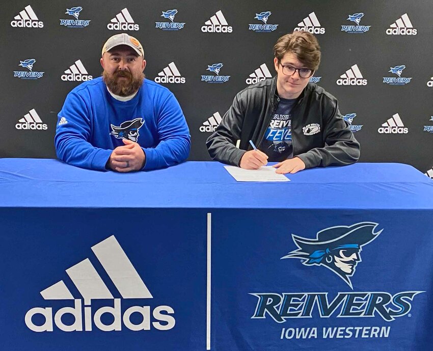 Blair Youth Shooting Sports' Hayden White, right, recently signed with coach Derek Pollock and the Iowa Western Community College shotgun sports team.