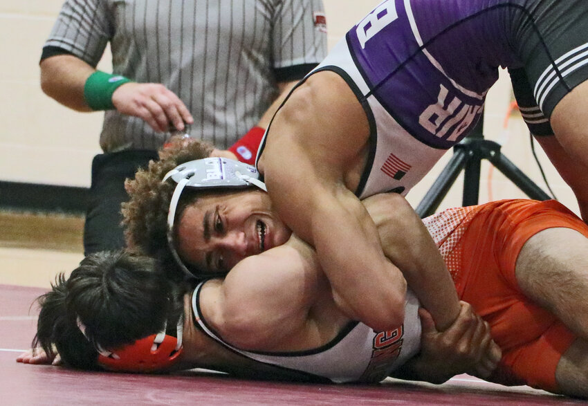 Blair 138-pounder Tyson Brown, top, controls his Hastings opponent Friday during the EMC Duals at Waverly.