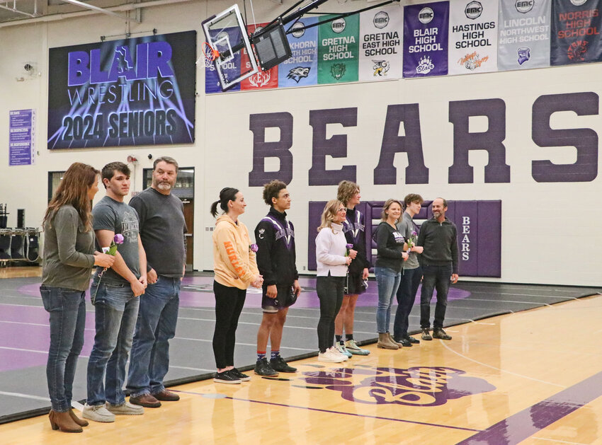 Seniors Hayden Berg, Tyson Brown, Atticus Dick and Brady Thomas were recognized in front of the crowd before Friday's dual at Blair High School.