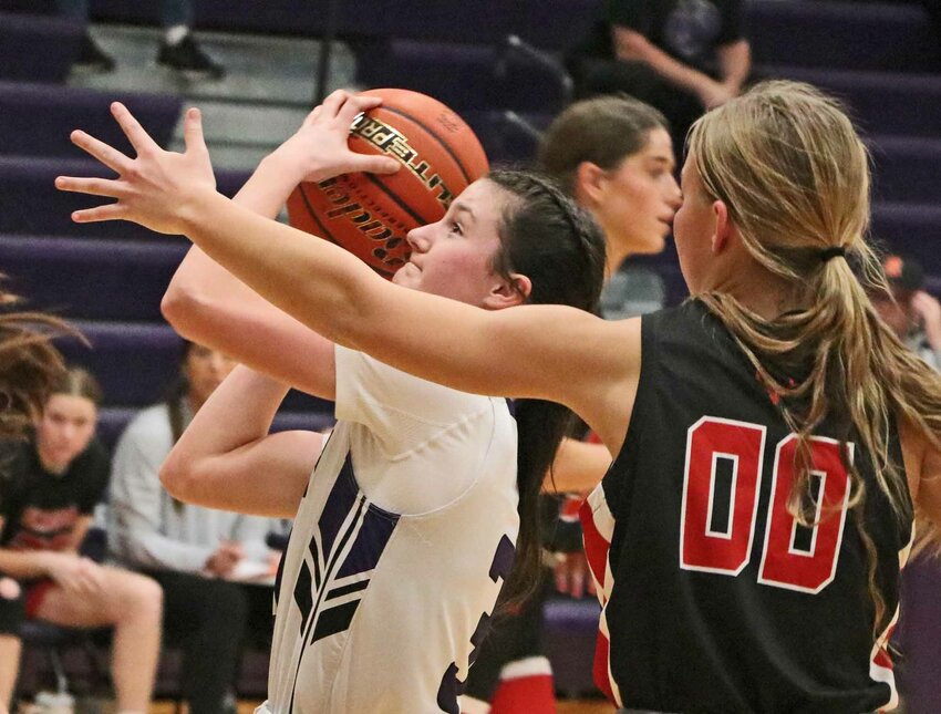 Bears guard Laynie Brown, left, looks to score inside against Elkhorn on Tuesday at Blair High School.