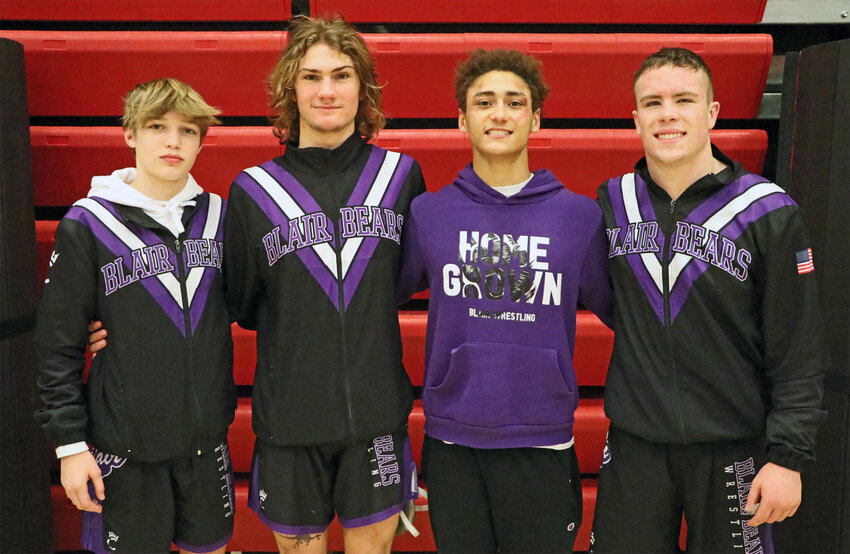 Blair Bears Tannon Bellamy, from left, Atticus Dick, Tyson Brown and Blaise Baughman secured state tournament berths Saturday during district competition in Aurora.