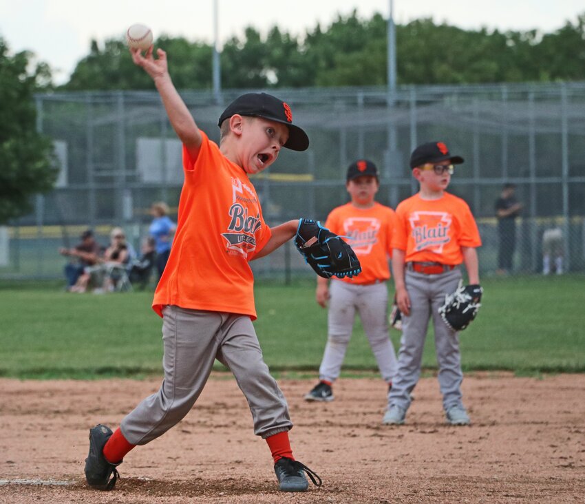 Kendrix Baughman of the Blair Little League Giants pitches Tuesday at the Youth Sports Complex.