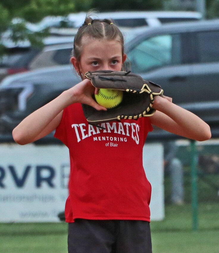 Braelyn Keller of the Teammates of Blair softball team gets ready to send another pitch her catcher's way Tuesday at the Youth Sports Complex.