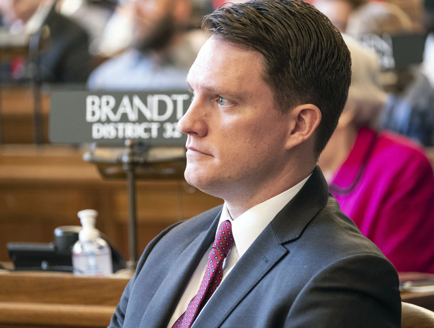 State legislator Ben Hansen listens to a speaker as the 2019 session opened.