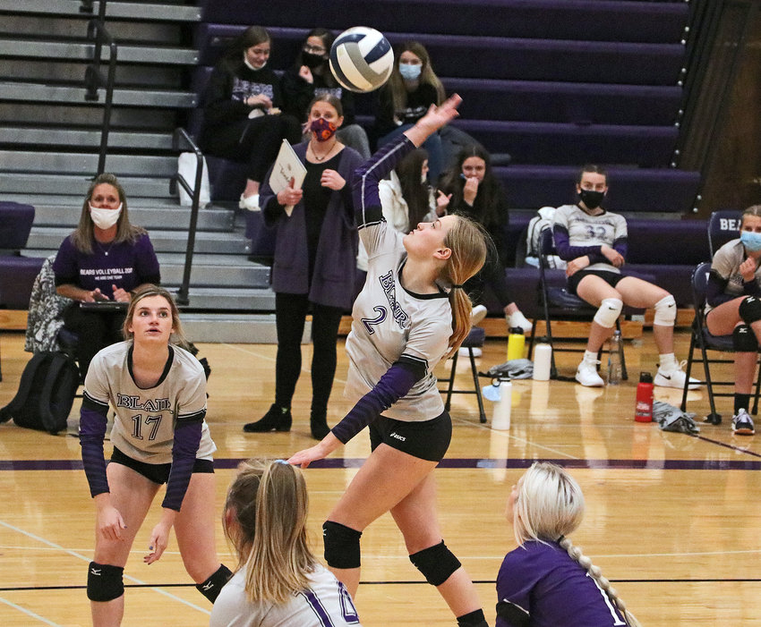 Bears senior Carley Damme rises to spike the ball Tuesday during the B-5 Subdistrict Tournament at Blair High School.