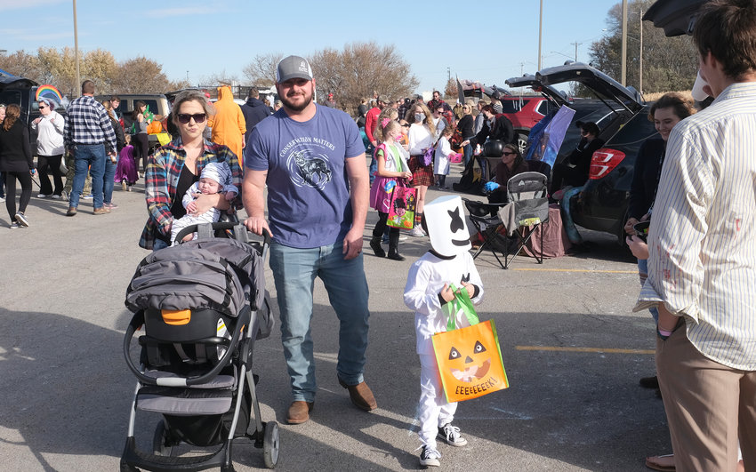Heather holding son Blaze with husband Brent and son Brycen were one of many families taking part in the Trunk or Treat festivities at the Blair Family YMCA on Saturday.