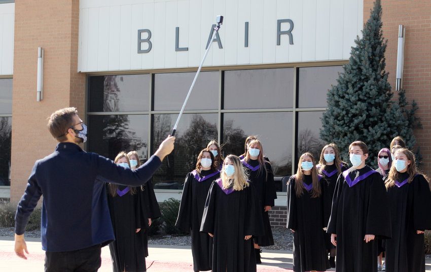 Director Kirk Schjodt records the Blair High School choir for a virtual concert, which will be released at a date to be determined, on Wednesday.