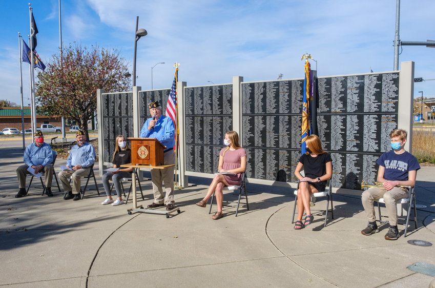 Carl Lorenzen, chairman of the Washington County Veterans Tribute Plaza Memorial, leads a Veterans Day ceremony Wednesday as its recorded to be shown at schools and nursing homes on Veterans Day.