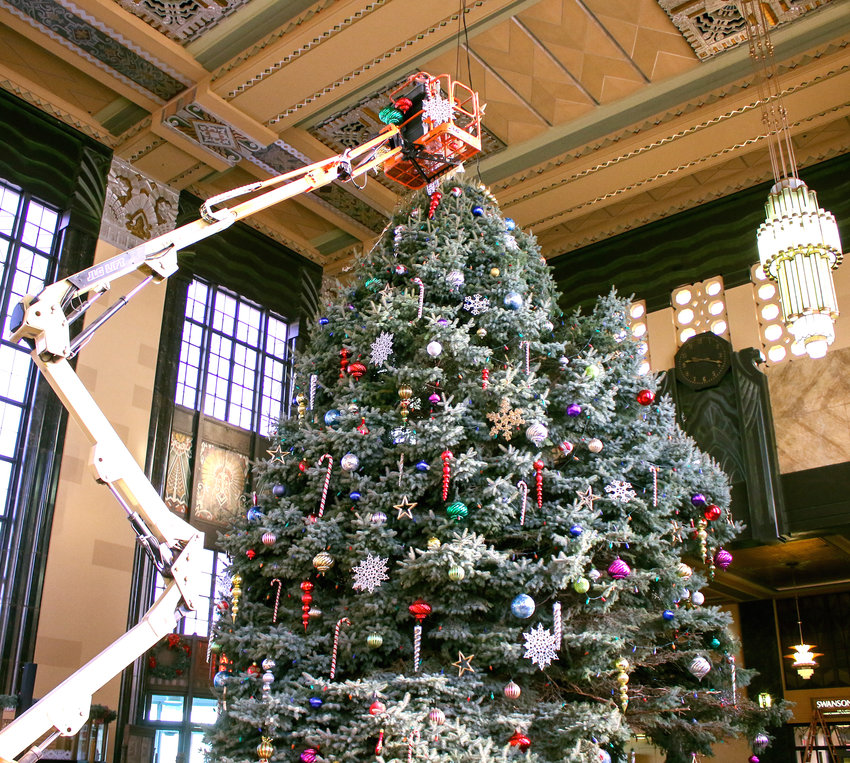 The tree donated by Jason and Fallon Ross of Omaha is decorated at the Durham Museum for Christmas at Union Station. The tree was moved Nov. 16 from the house near 132nd and Giles St.