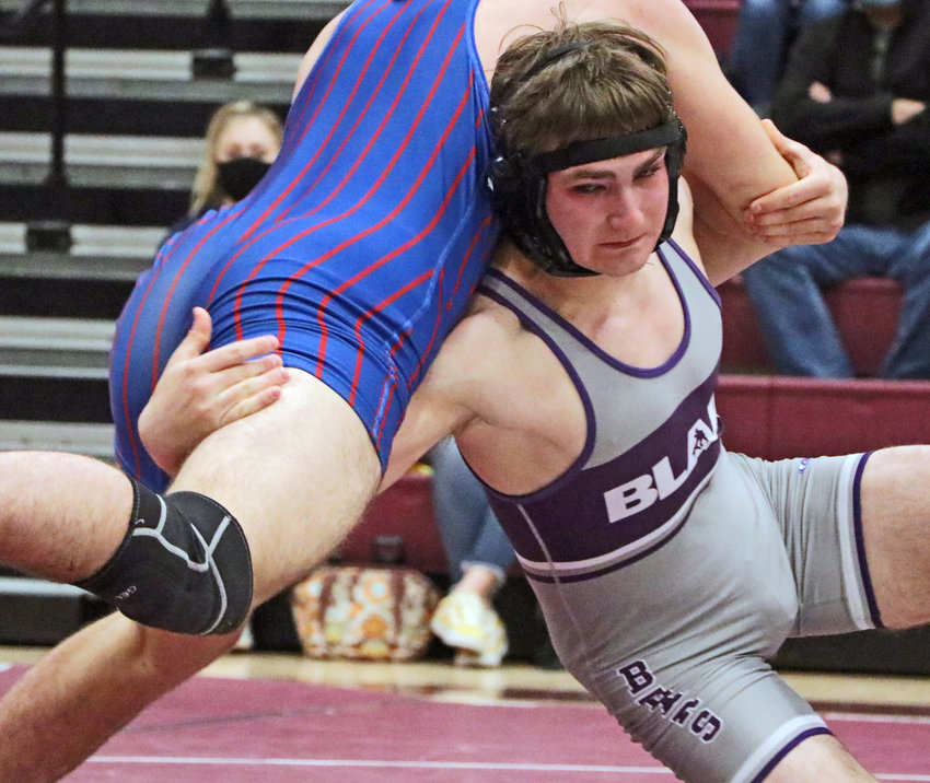 Blair 160-pounder Dylan Berg, right, shoots for a takedown against Norris' Benjamin Schoenbeck on Friday at Blair High School