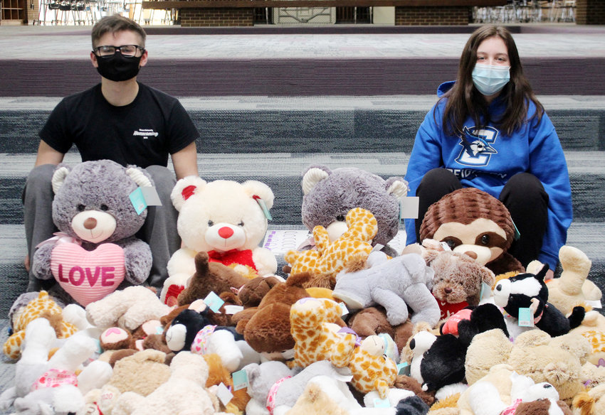 The Blair High School Student Senate is collecting new teddy bears to donate to Children's Hospital. Kolton Hammer, president, and MaKenzie Mencke, vice president, show the bears that have already been donated.
