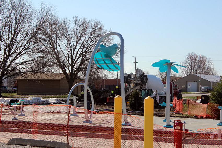 The splash pad, part of the proposed park for the Adam Street Cooridor, is expected to be complete by Memorial Day. The splash pad will have several features including a dump bucket.