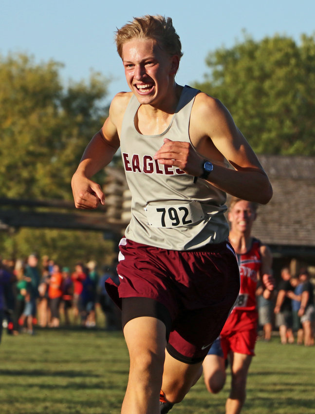 First-place Arlington sophomore Nolan May races to the finish line Thursday at Fort Atkinson.