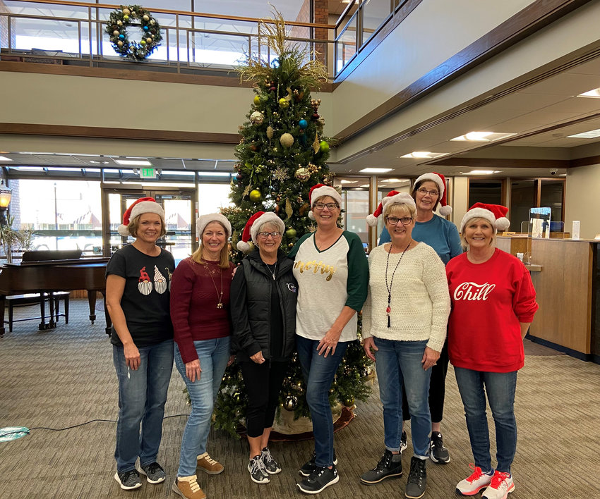 Board members of the Memorial Community Hospital and Health System's Auxiliary decorated Washington County Bank for Christmas, and have been doing so for the last few years. Pictured from left, Vicki Janssen, Jan Quist, Leslie Watts, Pat Rogers, Mary Kempcke, Merri Misfeldt and Betty Rhoades.