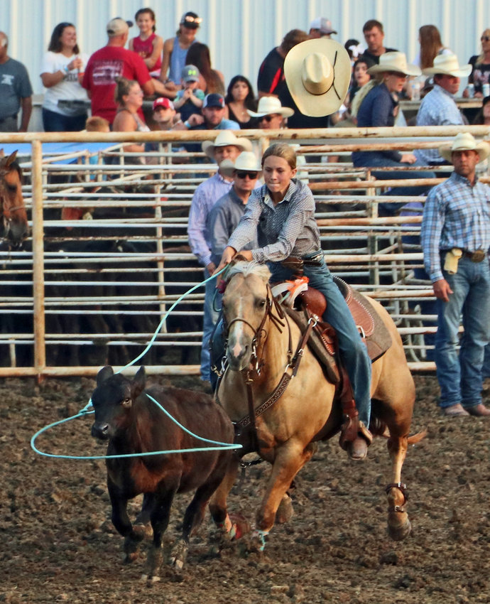 Laney Hoier of Herman loses her hat while winning the first performance of the breakaway roping at the Washington County Fairgrounds. The return of the Washington County Fair highlighted the summer of 2021.