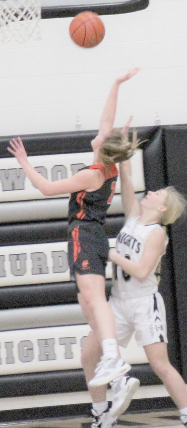 Syd Guzinski finds an opening to drive to the basket for a layup.