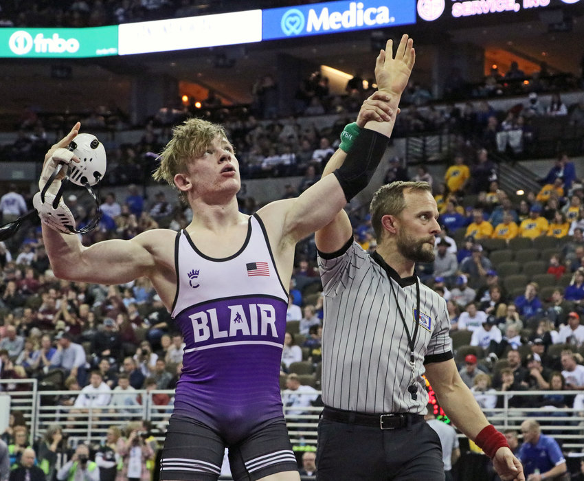 Blair 160-pounder Charlie Powers has hand raised Friday after qualifying for the Class B finals during the NSAA State Championships in Omaha.