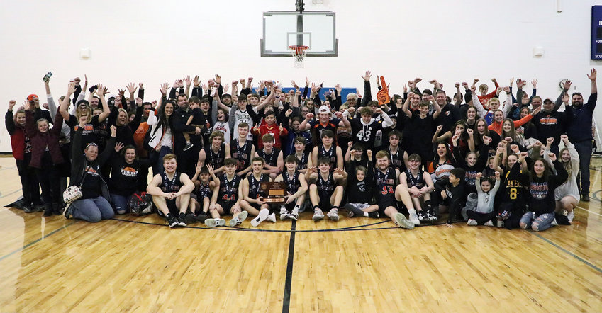 With a wealth of community support, the Fort Calhoun boys basketball team qualified for the 2022 NSAA State Championships and finished fourth in Class C1. The Pioneers and their supporters posed for this photo Friday after the third-place game at Lincoln East High School.