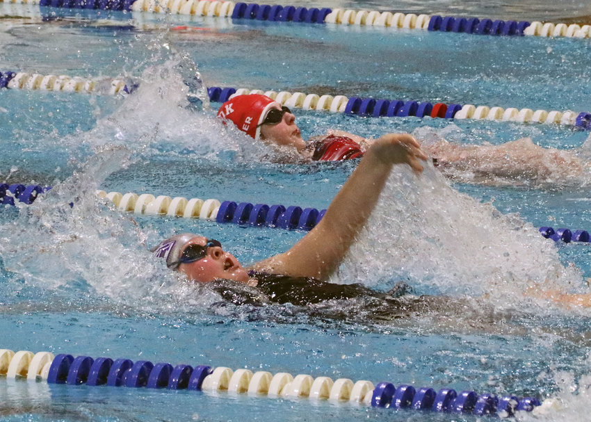 Blair swimmer Emma Hernandez, front, competes Saturday during the YMCA State Championship meet at the Dillon Family Aquatics Center in Fremont.